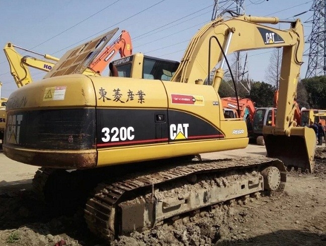 Excavadora para gatos usada